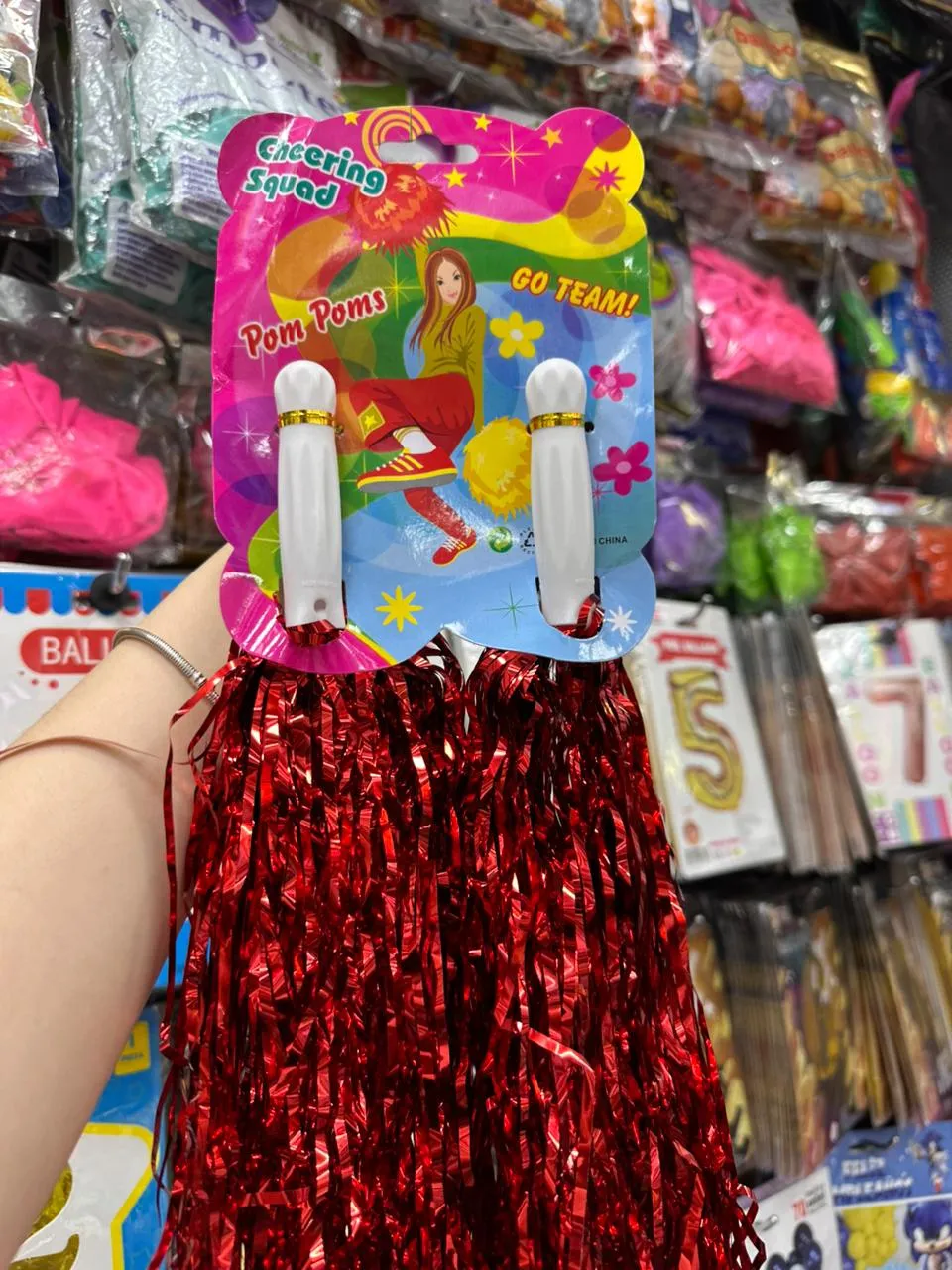 POMPONES